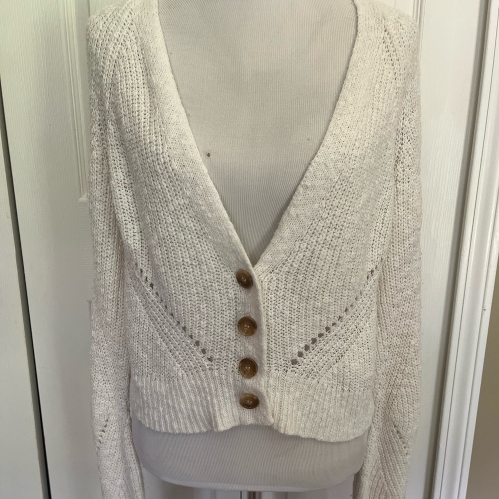 cream colored sweater with brown bottoms